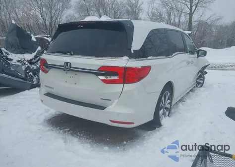 2022 Honda Odyssey Touring z USA, uszkodzony, nr VIN 5FNRL6H8XNB026593